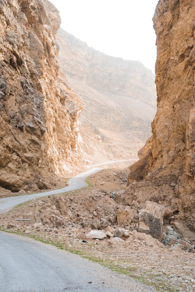 Empty Road among Rocks in Canyon